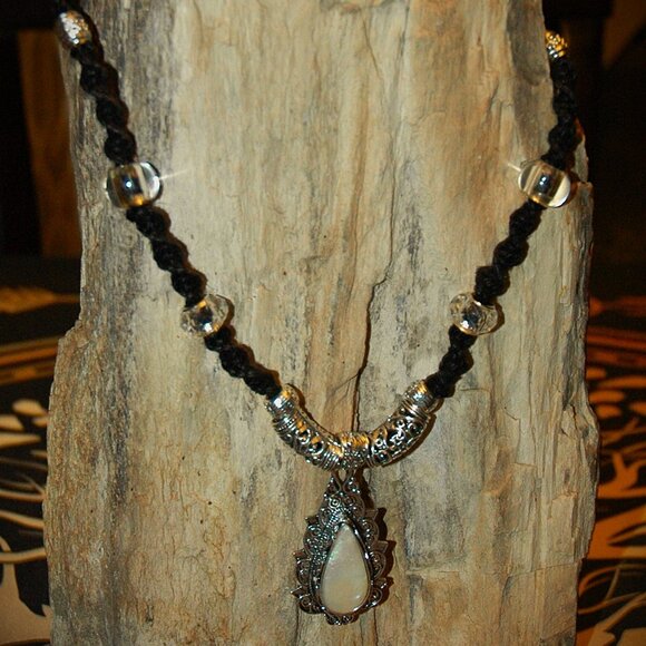 Elegant Opalescence Teardrop Cabochon on a 20" Handmade Black Hemp Necklace - Picture 4 of 7